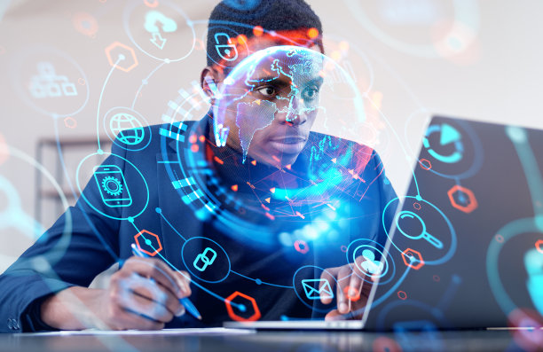 非洲商人注意并使用笔记本电脑，地球地球仪和发光图标图片下载