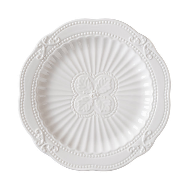 空甜点瓷盘镂空。白色盘子，白色背景上有纹理的花卉图案。美丽的复古陶器食品设计。餐具的概念。图片下载