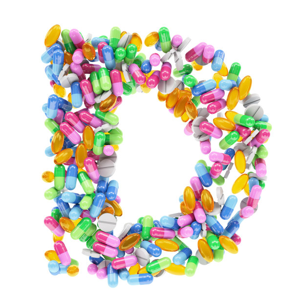 D字母由药丸、药物和维生素分离在白色图片下载