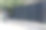 用漆成灰色到黑色的金属条做成的栅栏。网在顶部对角线向下连接。栅栏是优雅透明的石墙基础，混凝土，动物园，院子，住宅图片下载