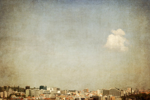 一个城市景观的纹理图片与单一的云和复制空间图片下载