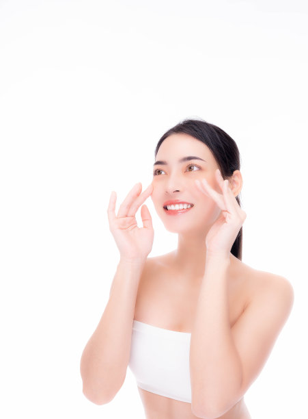 美丽的亚洲女性按摩美容脸快乐年轻的亚洲女性有美丽的面部皮肤有吸引力的女孩看起来很漂亮，微笑的脸孤立在白色的背景护肤水疗健康的皮肤概念图片下载