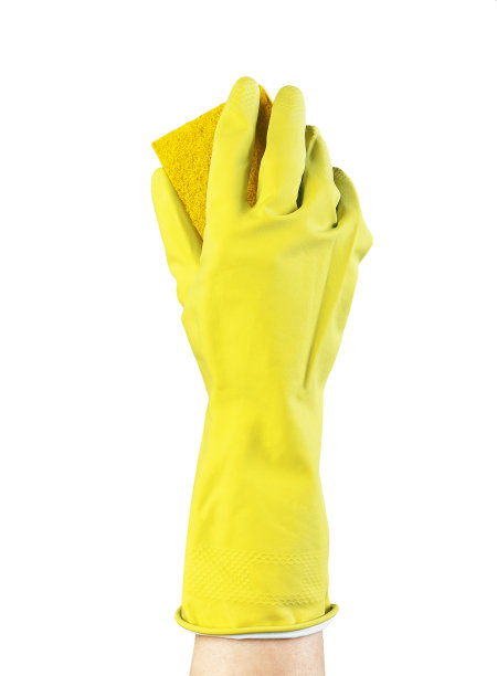 手戴黄色橡胶手套，用清洗海绵隔离在白色背景上图片下载
