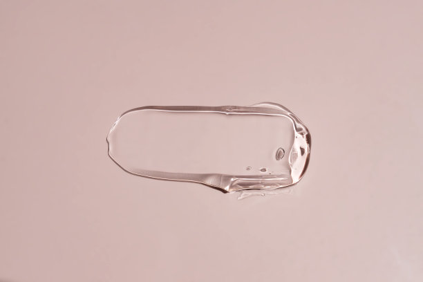 凝胶精华质地化妆品背景，护肤玻尿酸产品或美容护理米色凝胶涂抹。图片下载