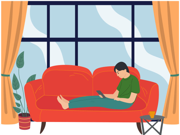 男人坐在沙发上在公寓里喝咖啡或茶：独自在家的人图片下载