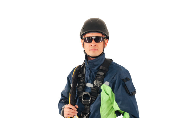肖像工业登山工人在制服和太阳镜白色空孤立的背景，看着相机。绳索进入工人摆姿势。工业城市工程概念。复制广告文字空间图片下载