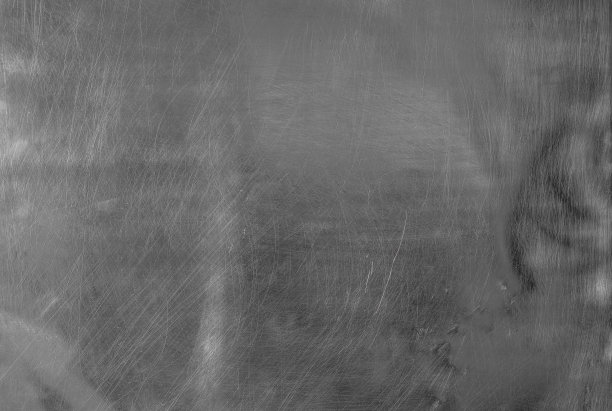 金属表面。铜合金。黑色和白色。图片下载