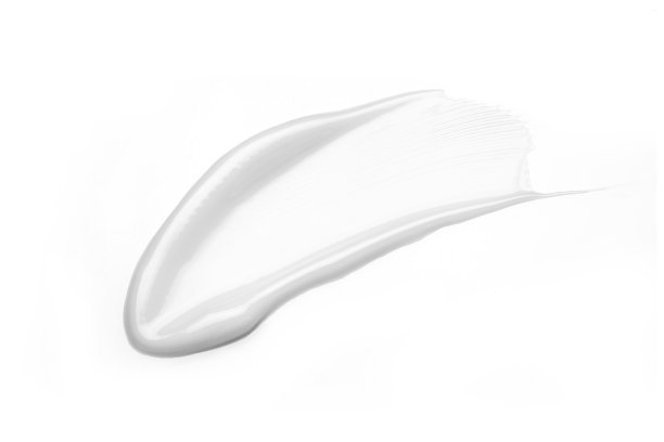 白色化妆品霜乳液色块涂抹涂抹在白色背景。图片下载