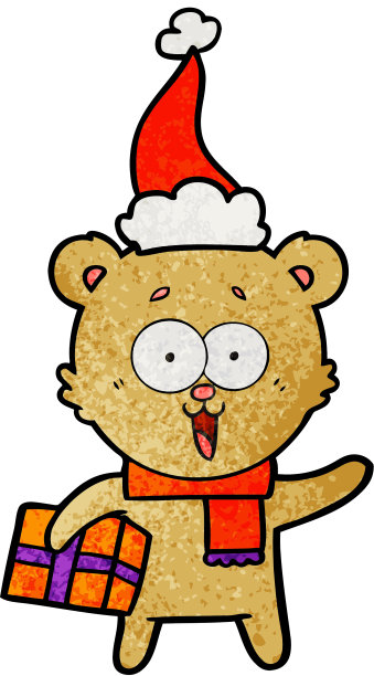 笑嘻嘻的泰迪熊带着圣诞礼物戴着圣诞帽图片下载