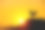 ฺBeauty sunrise silhouette rooster crowing on roof home on sky gold yellow orange background图片下载