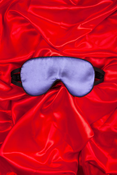 真丝睡眠面膜在真丝背景图片下载