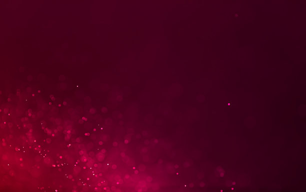 圣诞灯上的红色散景闪光或模糊的背景。图片下载