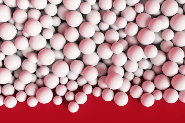 红墙旁的一大堆抽象的白色球体。背景3d渲染插图。图片下载