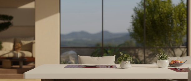 现代餐厅的白色餐桌，透过窗户可以看到美丽的景色图片下载