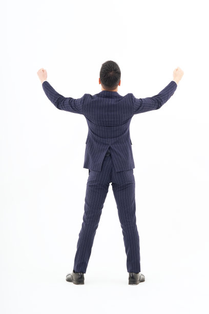 西装男子:穿着西装表示喜悦的男子图片下载