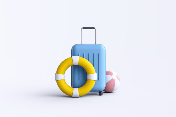 白色背景的旅行箱，球和游泳圈图片下载