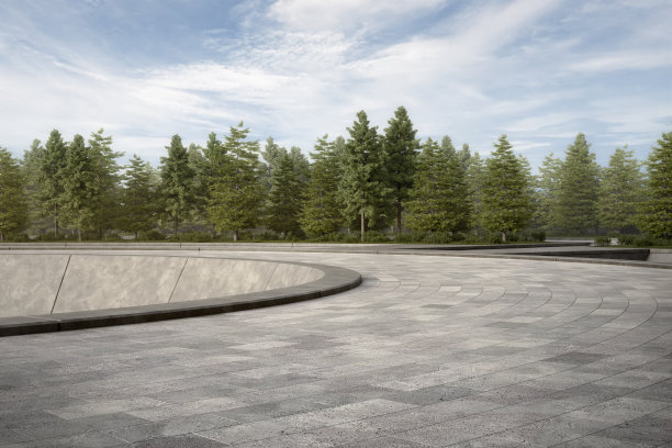 空旷弯曲的混凝土小径，草地和树木。图片下载