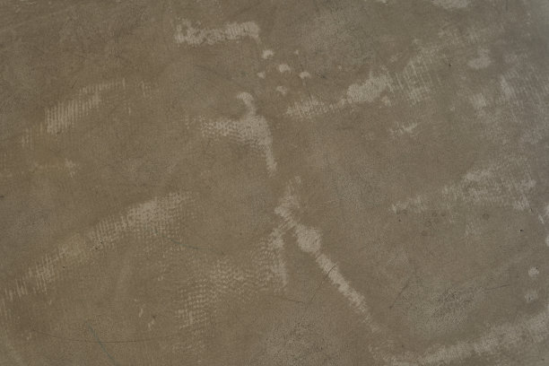 棕色混凝土纹理。石墙背景。旧混凝土地板表面有划痕。高质量照片图片下载