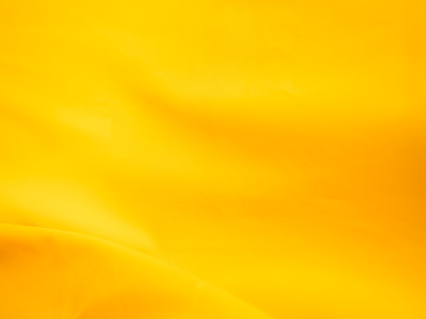 黄色布颜色面料轻纹理图案背景，金黄色丝绸波浪纹理抽象设计横幅，假日旅游夏季卡，渐变缎面光滑形状丰富多彩，抽象豪华图片下载