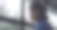 不开心的男生看着窗户坐在大厅里。男孩起身离开大厅。图片下载