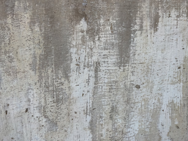 灰色的水泥背景，涂上褪色的白色油漆，显露出水泥板的质感，形成了一个美丽的艺术背景。抽象的背景。图片下载
