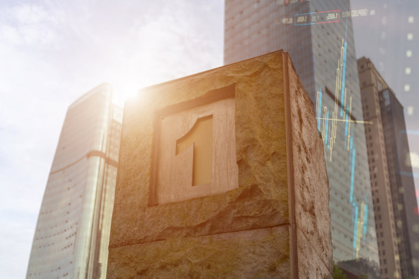 第一个刻在一块石头上对抗现代商业建筑-商业成功的概念图片下载