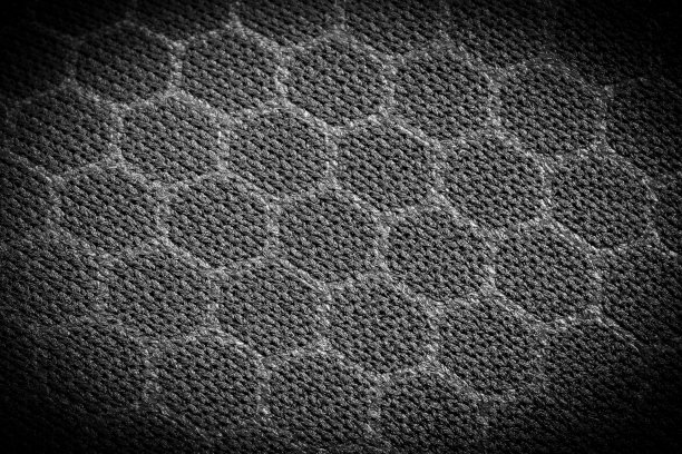 有六角形图案的有晕纹的纺织材料。黑白背景图片下载