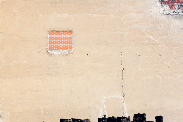 旧的灰泥墙可以看到部分砖图片下载