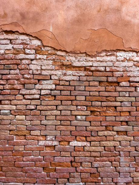 褪色的砖墙，垂直图片下载