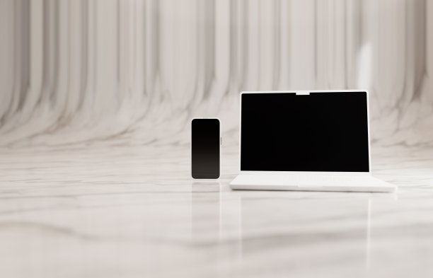 模拟哑光白色高级笔记本电脑和智能手机。呈现在白色大理石工作室地板上。图片下载