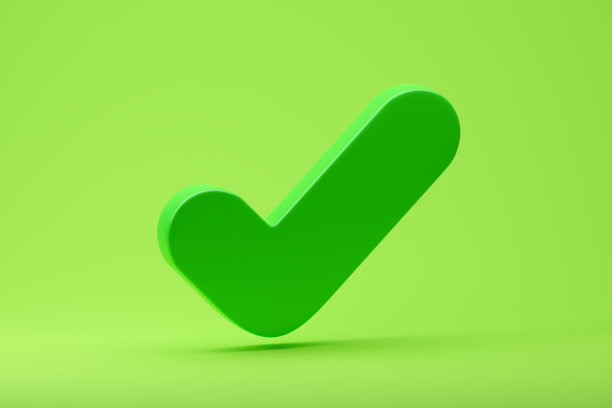 绿色复选标记图标或标记隔离在绿色背景上。图片下载