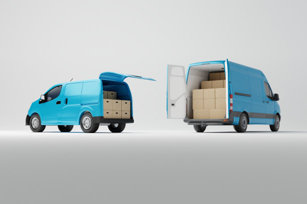 两辆蓝色的商业货车，白色背景的纸箱。图片下载