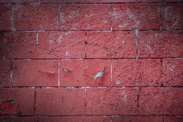 纹理背景或工作室背景破旧的红砖与石膏脱落。图片下载