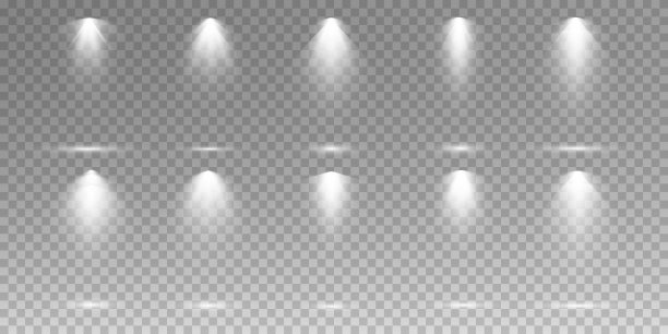 舞台灯光，在透明的背景上。带有聚光灯的明亮照明。定向工作室灯。图片下载