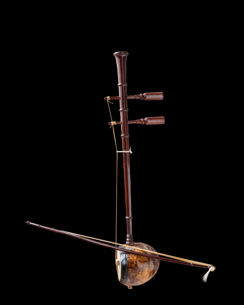 一种乐器，小提琴，黑色背景图片下载