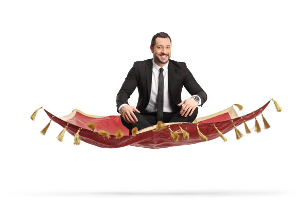 西装革履的年轻职业男士在红地毯上翩翩起舞图片下载