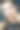 一个白人女孩穿着一件裁剪条纹的裙子，在黑暗的背景下做模特图片下载