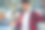 一名男子在乘坐公交车时使用智能手机图片下载