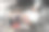 肖像亚洲年轻男子在厨师制服烹饪牛排火与学生女助理厨师在厨房图片下载