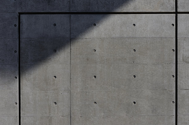 带有线条和阴影的深色混凝土墙图片下载