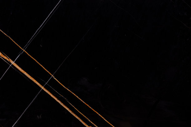 撒哈拉黑色大理石背景，深色纹理作为您办公室内部的一部分。图片下载