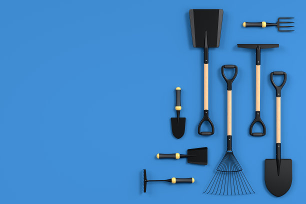 花园铲，干草叉和耙在蓝色背景，夏季露营的概念图片下载