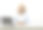 快乐的女商人使用笔记本电脑在线工作在桌子上，坐在灯光工作室背景，复制空间图片下载