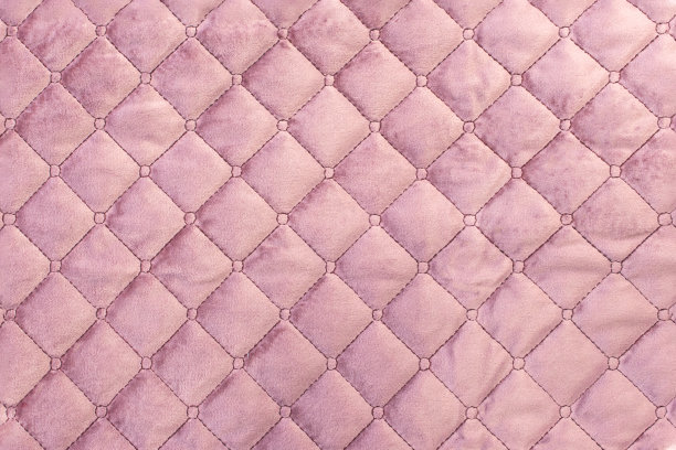 绗缝天鹅绒扣经典粉红色织物墙图案背景。优雅的复古豪华沙发内饰。室内毛绒背景。图片下载