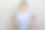 女子拿着两部手机，大眼睛大嘴巴看着镜头。图片下载