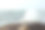 海浪的镜头。水花溅到石头上。海浪在岩石间翻腾。潮水的背景。图片下载