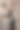 肖像的两个美丽的女人金发和黑发在别致的白色和黑色闪亮的连衣裙手套。化妆和发型，配饰和图片下载