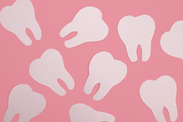 白色的纸牙在粉红色的背景，背景，纹理图片下载