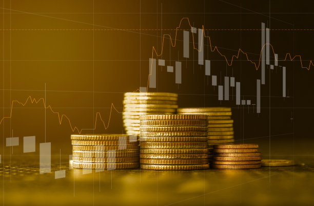 有交易图的金币堆叠，金融投资概念可以作为背景图片下载