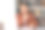 快乐的韩国男教师在笔记本电脑旁做笔记图片下载